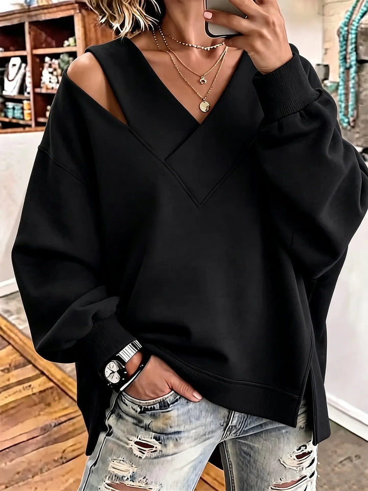 Kirstan - Sudadera Oversize Con Cuello en V y Aberturas Elegantes