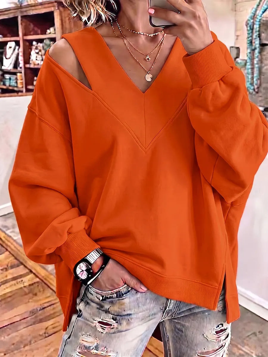 Kirstan - Sudadera Oversize Con Cuello en V y Aberturas Elegantes
