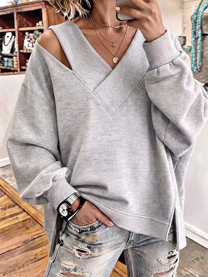 Kirstan - Sudadera Oversize Con Cuello en V y Aberturas Elegantes
