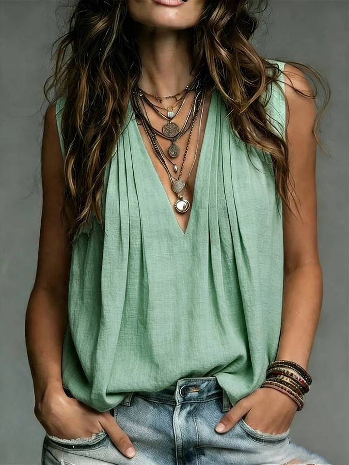 Reem - Blusa Sin Mangas Plisada Y De Corte Holgado