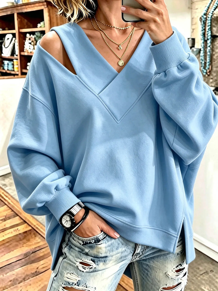 Kirstan - Sudadera Oversize Con Cuello en V y Aberturas Elegantes